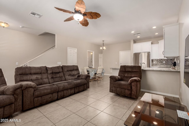 125 N Sunvalley Blvd Unit 119, Mesa, AZ 85207 - living area with ceiling fan, light tile patterned flooring, recessed lighting, and a chandelier