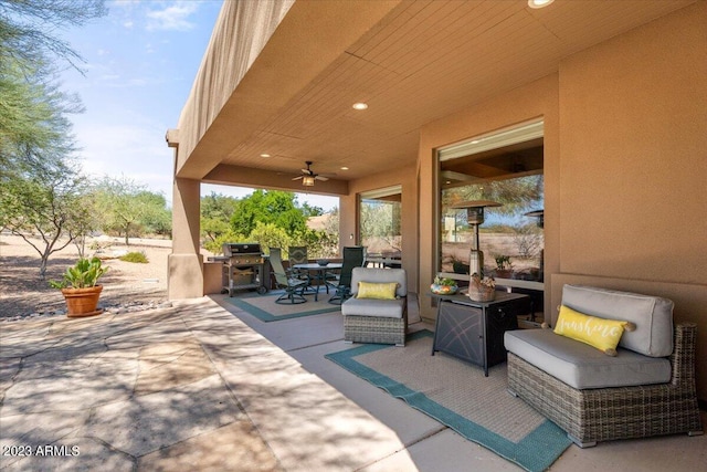 view of patio / terrace featuring ceiling fan and a grill