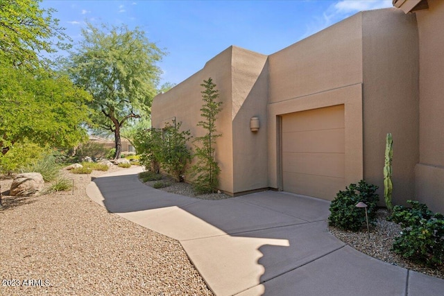 view of home's exterior featuring a garage