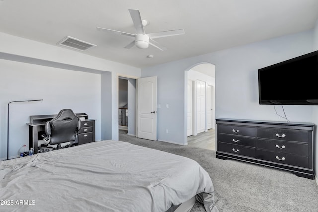 carpeted bedroom featuring ceiling fan