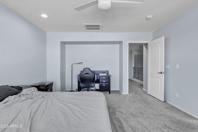 bedroom with light carpet and ceiling fan