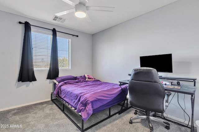 bedroom with ceiling fan and carpet