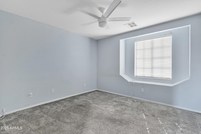 unfurnished room with carpet and ceiling fan