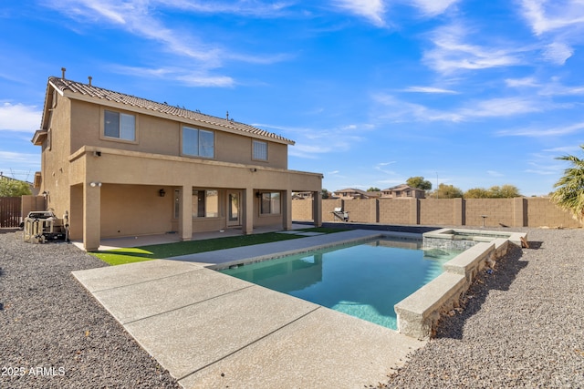 view of pool featuring an in ground hot tub and a patio area