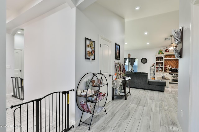 hall with light hardwood / wood-style flooring