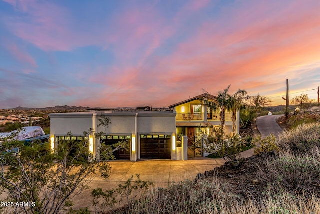 36723 N 33rd Ave, Phoenix, AZ 85086 - view of front facade featuring stucco siding, driveway, a garage, and a balcony