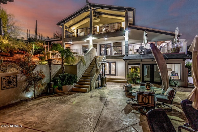 36723 N 33rd Ave, Phoenix, AZ 85086 - rear view of house with a balcony, stucco siding, stairs, and a patio