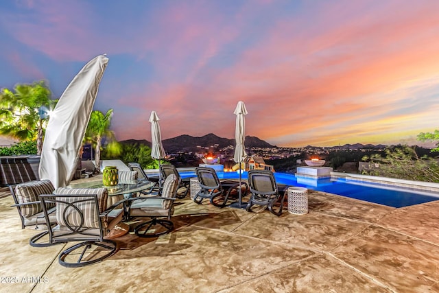 36723 N 33rd Ave, Phoenix, AZ 85086 - patio terrace at dusk with an outdoor pool and outdoor dining space