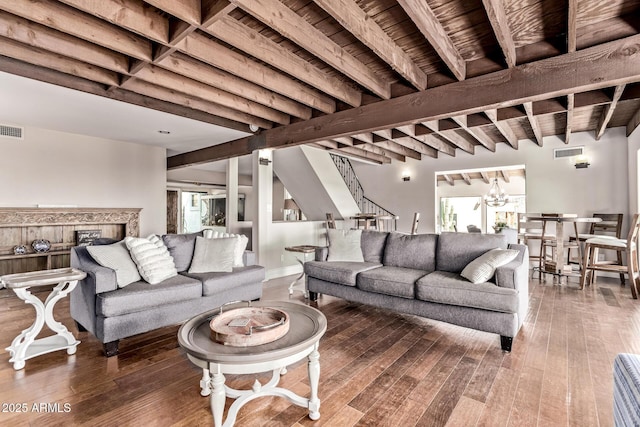 36723 N 33rd Ave, Phoenix, AZ 85086 - living room with beamed ceiling, visible vents, stairway, and wood-type flooring
