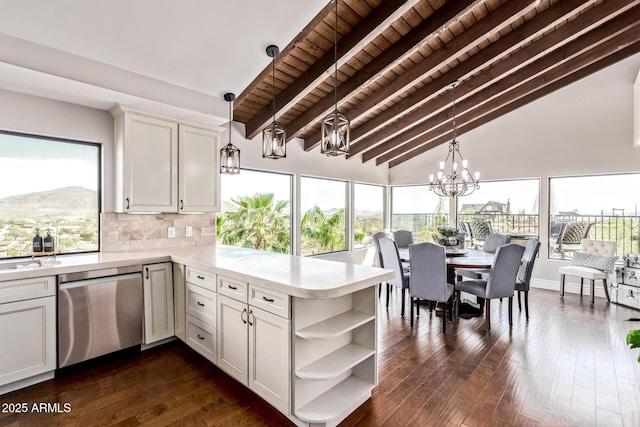 36723 N 33rd Ave, Phoenix, AZ 85086 - kitchen featuring light countertops, open shelves, a peninsula, stainless steel dishwasher, and decorative backsplash