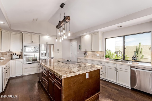 36723 N 33rd Ave, Phoenix, AZ 85086 - kitchen with dark wood finished floors, a sink, vaulted ceiling, and appliances with stainless steel finishes