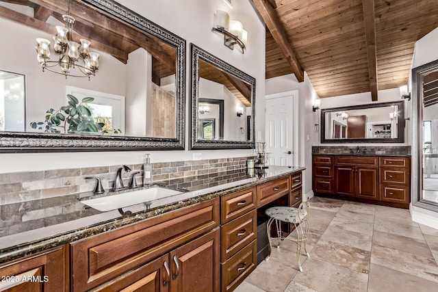 36723 N 33rd Ave, Phoenix, AZ 85086 - bathroom with wooden ceiling, vanity, backsplash, a chandelier, and vaulted ceiling with beams