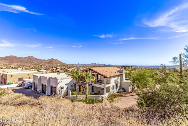 36723 N 33rd Ave, Phoenix, AZ 85086 - back of property featuring a balcony, stucco siding, a garage, and a mountain view