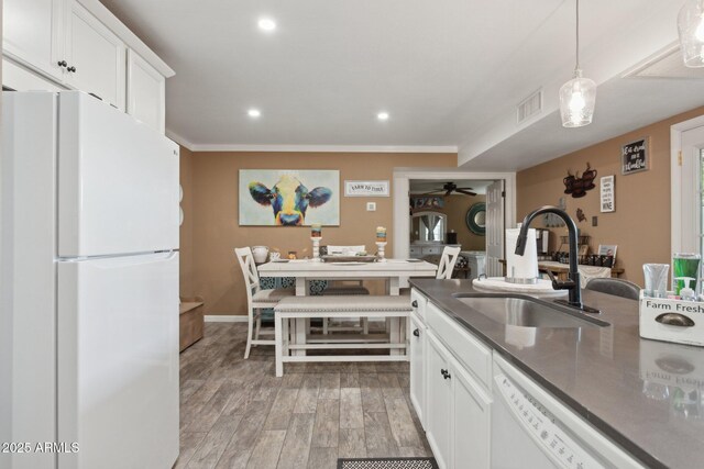 5154 N 83rd St, Scottsdale, AZ 85250 - kitchen featuring white appliances, a sink, recessed lighting, white cabinetry, and dark countertops