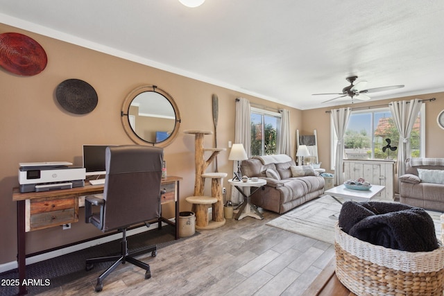 5154 N 83rd St, Scottsdale, AZ 85250 - living room featuring wood finished floors, an office area, a ceiling fan, and crown molding