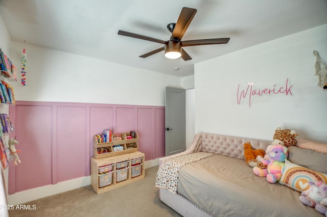 bedroom with ceiling fan and light carpet