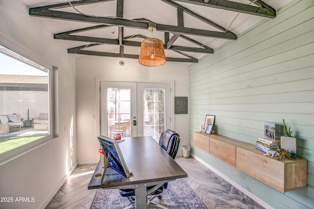 office with parquet floors, wooden walls, vaulted ceiling with beams, and french doors