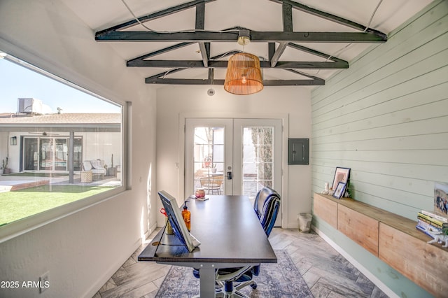 office space featuring french doors, wood walls, lofted ceiling with beams, parquet floors, and electric panel