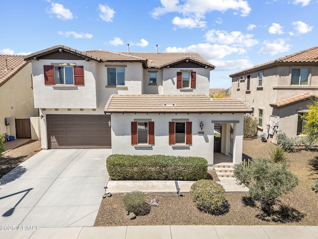 31156 N 137th Ln, Peoria, AZ 85383 - mediterranean / spanish house with concrete driveway, stucco siding, a tiled roof, and a garage
