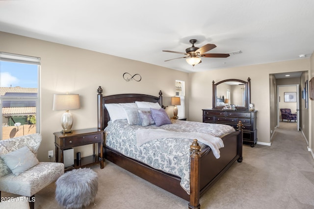 31156 N 137th Ln, Peoria, AZ 85383 - bedroom with light carpet, baseboards, and a ceiling fan
