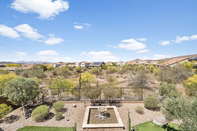 31156 N 137th Ln, Peoria, AZ 85383 - view of yard featuring fence, a residential view, and a vegetable garden