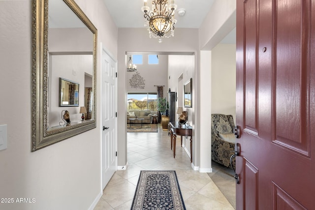 31156 N 137th Ln, Peoria, AZ 85383 - foyer entrance featuring a chandelier, light tile patterned floors, and baseboards