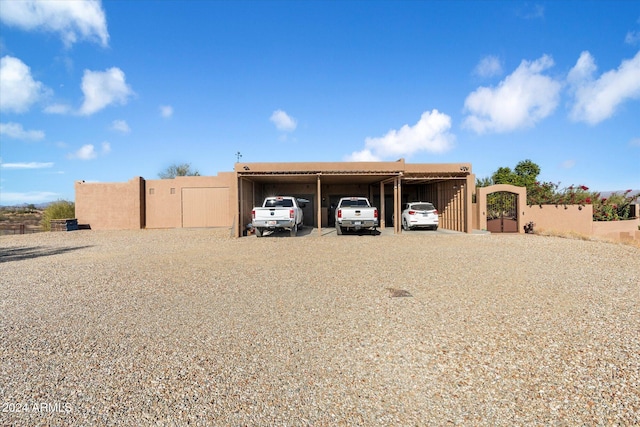 view of front facade featuring a carport