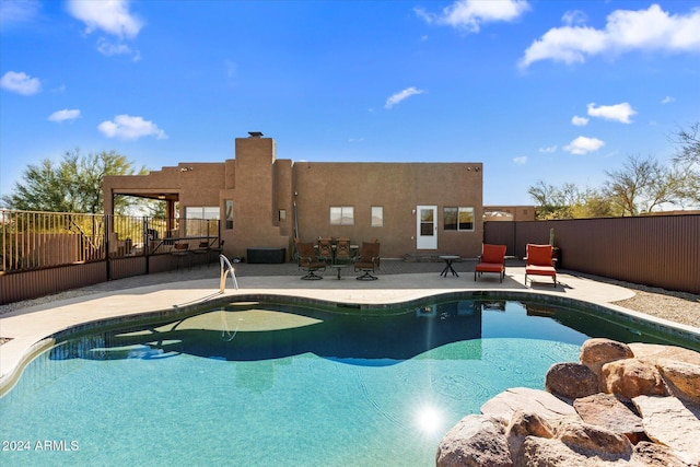 view of pool featuring a patio area