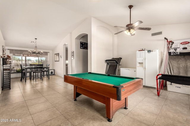 playroom with ceiling fan, light tile patterned floors, arched walkways, and visible vents