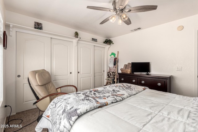 bedroom with visible vents and ceiling fan