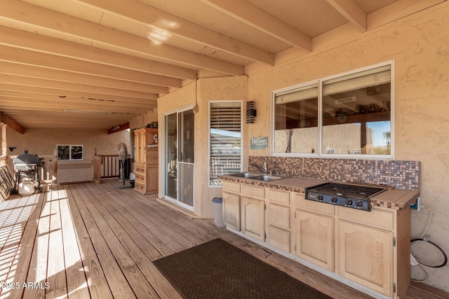 wooden terrace with a sink