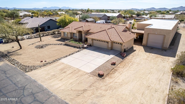 aerial view with a residential view and a mountain view