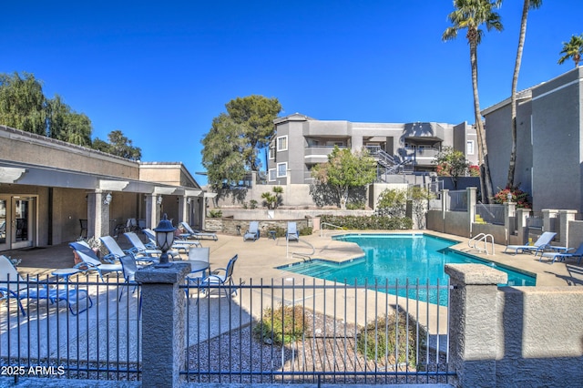 view of pool featuring a patio