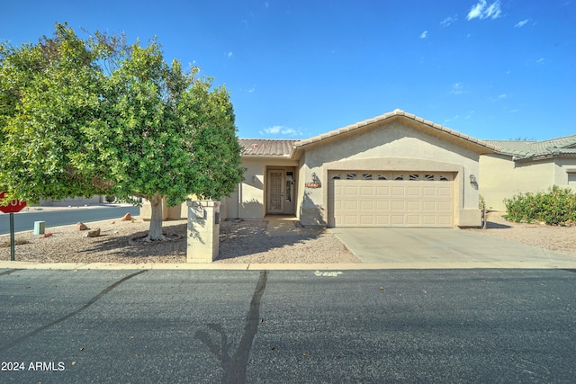 view of front of home with a garage