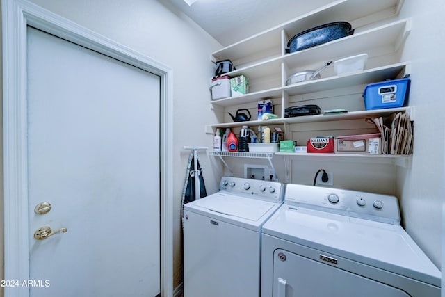 clothes washing area with independent washer and dryer