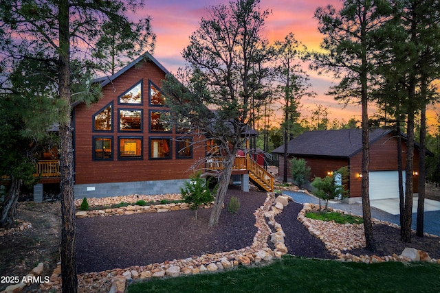 3334 Sawmill Ridge Loop, Heber, AZ 85928 - view of front of house with an outdoor structure, driveway, a wooden deck, and stairs