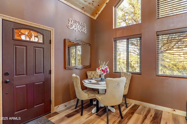 3334 Sawmill Ridge Loop, Heber, AZ 85928 - dining room featuring wood finished floors, baseboards, wooden ceiling, and high vaulted ceiling