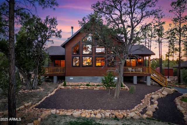 3334 Sawmill Ridge Loop, Heber, AZ 85928 - back of property with stairs, a shingled roof, covered porch, and crawl space