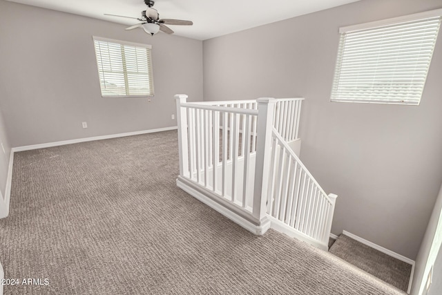 interior space featuring light colored carpet