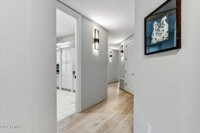 corridor featuring light hardwood / wood-style flooring