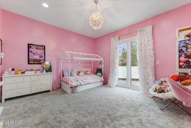 bedroom with light colored carpet, a chandelier, and access to outside