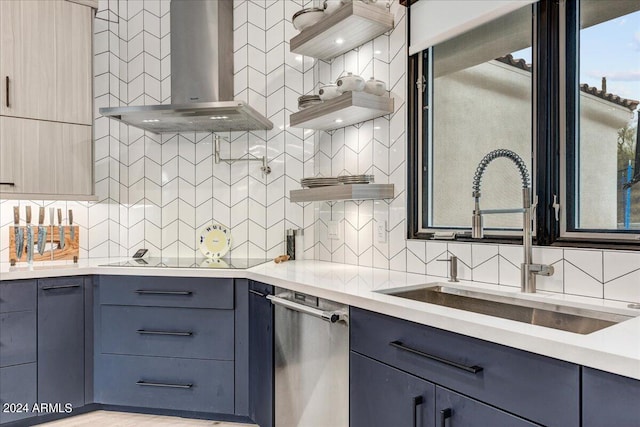 kitchen featuring wall chimney range hood, sink, tasteful backsplash, and stainless steel dishwasher