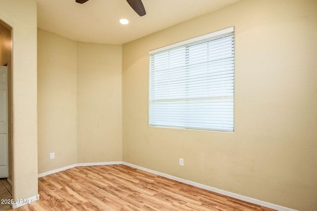 empty room with recessed lighting, baseboards, ceiling fan, and wood finished floors