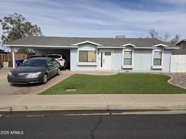 ranch-style house with a front lawn