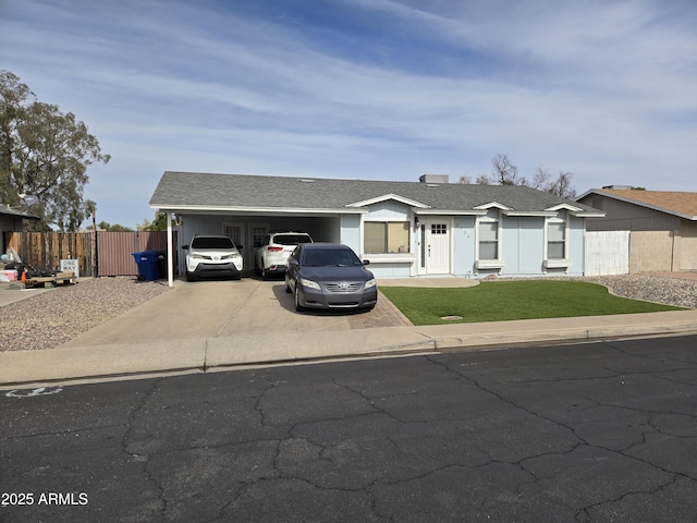 single story home featuring a carport