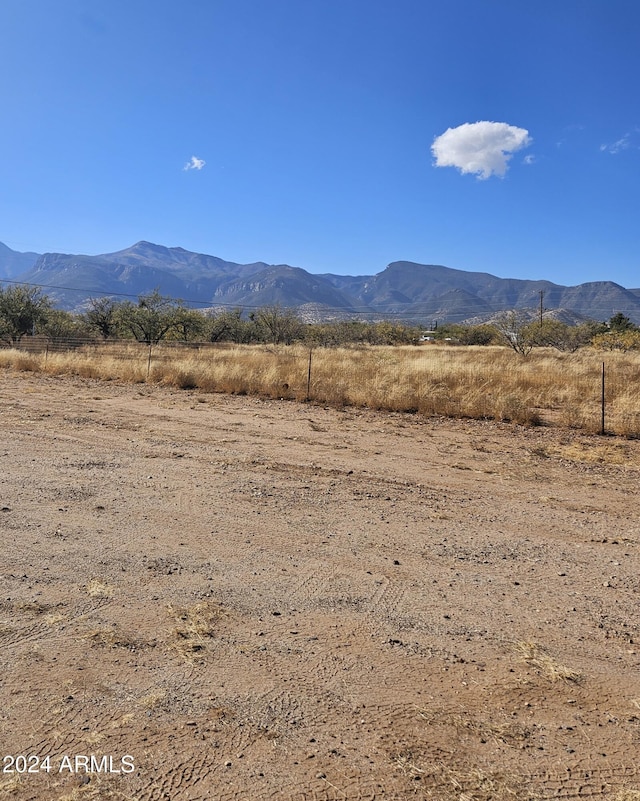 property view of mountains featuring a rural view