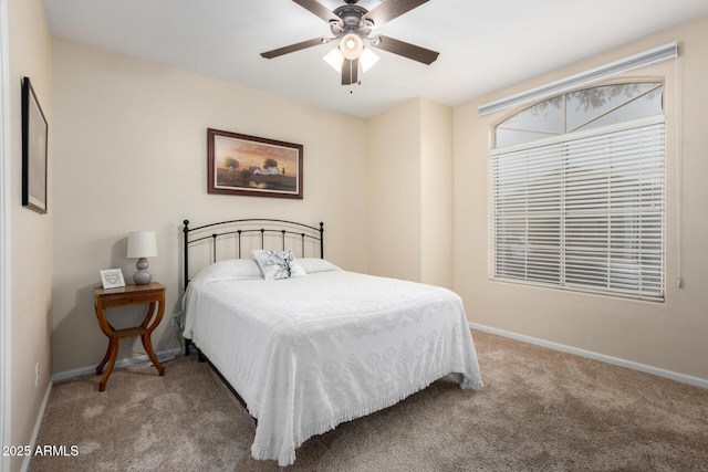 bedroom featuring ceiling fan and carpet flooring