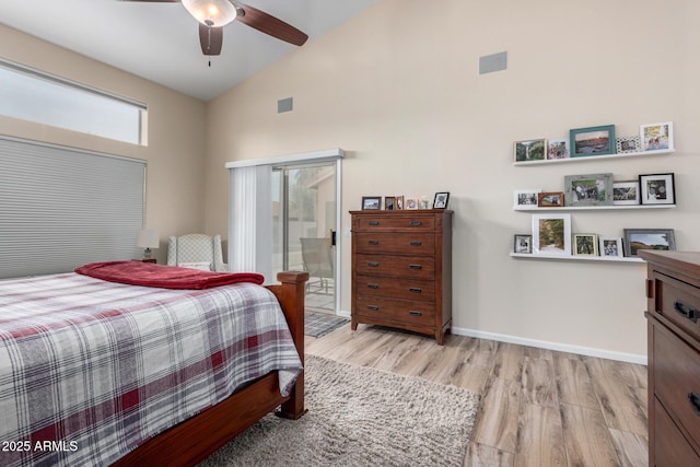 bedroom with ceiling fan, high vaulted ceiling, light wood-type flooring, and access to outside