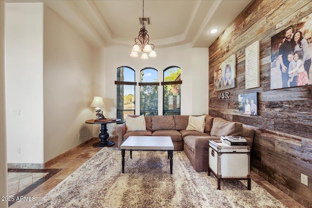 28025 N 156th Pl, Scottsdale, AZ 85262 - living room with stone tile flooring, a raised ceiling, baseboards, recessed lighting, and a chandelier