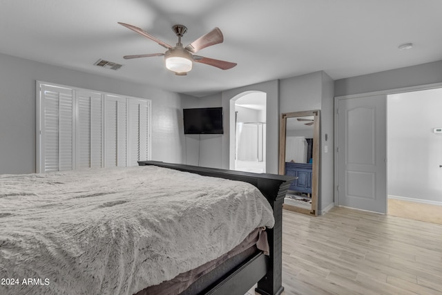 bedroom featuring light wood-type flooring and ceiling fan